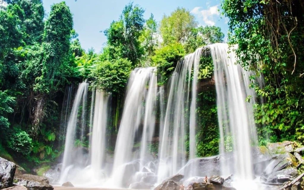 Phnom Kulen waterfall surrounded by lush tropical forest in Siem Reap Province, Cambodia.