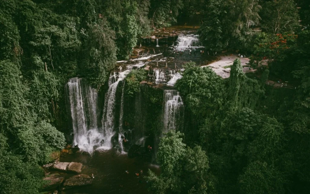 Waterfall surrounded by tropical forest at Phnom Kulen National Park, Cambodia.