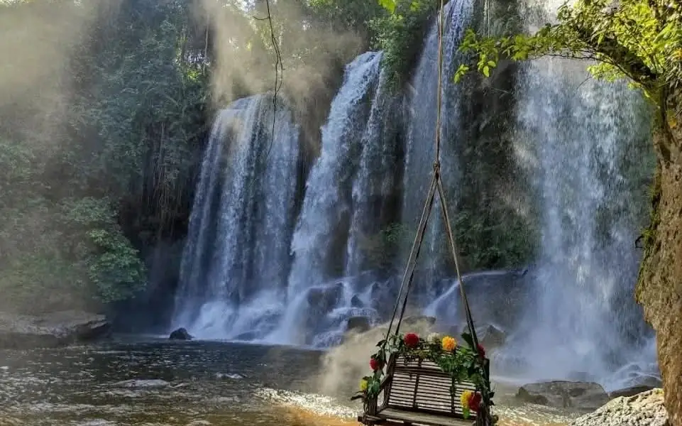 Waterfall cascading into a natural pool at Phnom Kulen National Park near Siem Reap, Cambodia